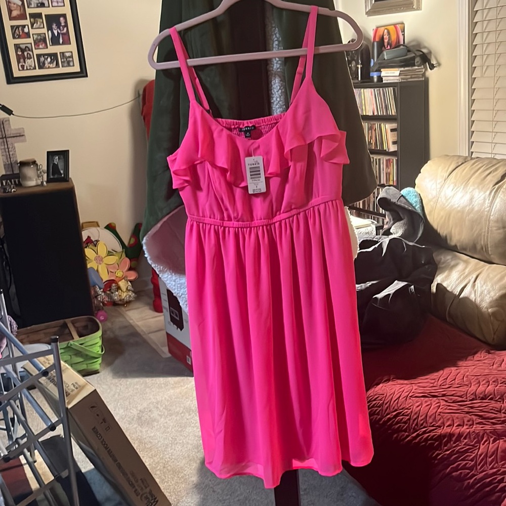 Bright Pink Torrid adjustable strap dress. Has a lining inside. Elastic waist.